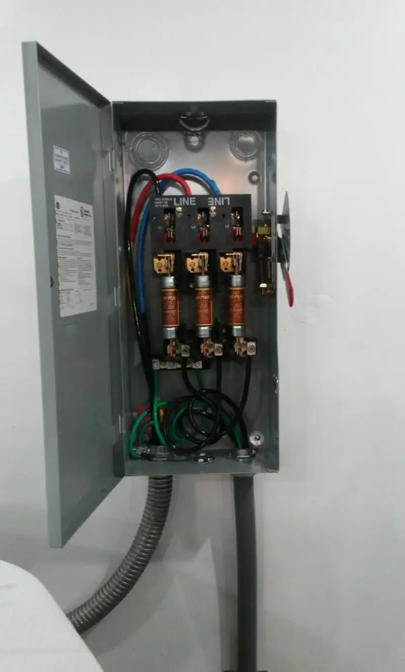 Three-phase disconnect switch installed for Smoke Detector Installation in Rexland Acres
